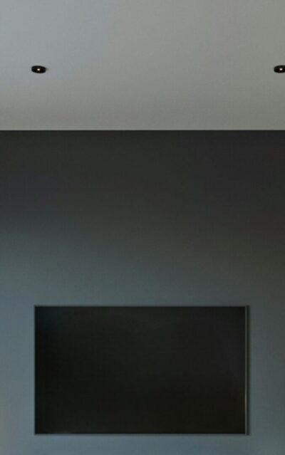 A picture of a TV on a blue wall