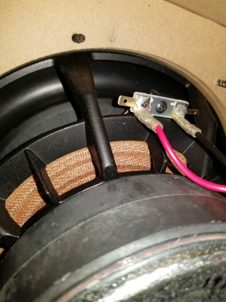 A picture of a subwoofer's internals